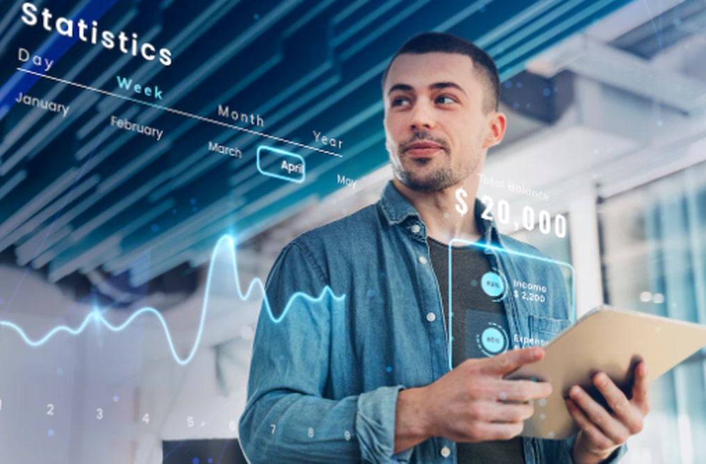 Junger Geschäftsmann mit Tablet betrachtet digitale Finanzstatistiken, Symbol für moderne Investmentstrategien mit Robo-Advisors.